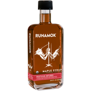 Runamok | Maple Syrups - Festivus Spice Infused in a glass bottle with a black cap, featuring a label highlighting its cinnamon and vanilla maple syrup infusion.