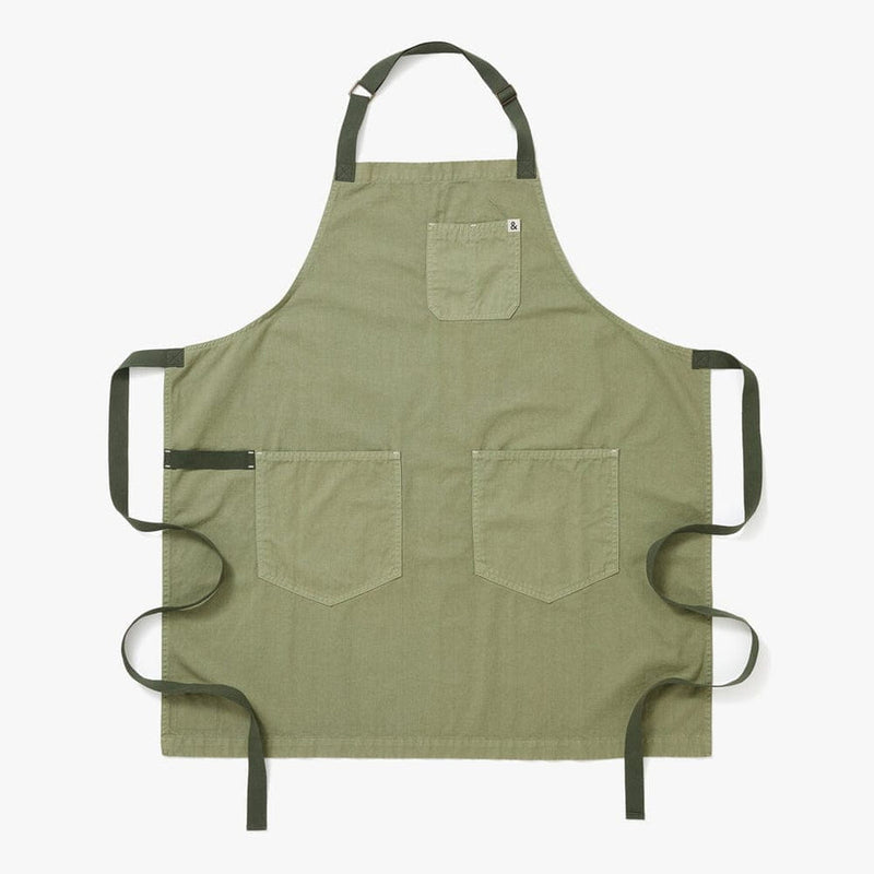 Hedley & Bennett | Essential Garment Dyed - Matcha apron, featuring an adjustable neck strap, two waist pockets, a chest pocket, and long waist ties, ideal for kitchen tasks.