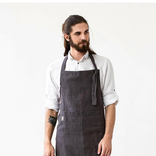 Men's Linen Bib Apron by MagicLinen in Charcoal Gray, featuring adjustable straps and a spacious twin-sectioned pocket, ideal for kitchen or gardening tasks.