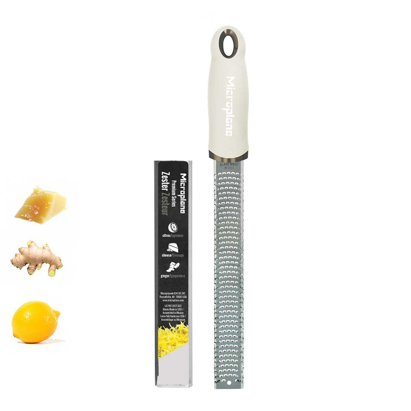 Microplane | Premium Zester, Grater - Cashmere Beige in retail sleeve, shown with lemon, ginger, and cheese for zesting and grating examples.
