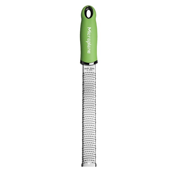 Microplane Premium Zester, Grater - Green: Long, narrow stainless-steel blade with sharp teeth, ideal for zesting citrus and grating hard cheeses and spices.