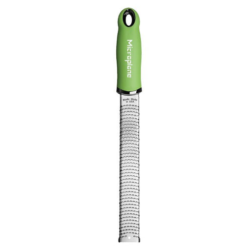 Microplane Premium Zester, Grater - Green: Long, narrow stainless-steel blade with sharp teeth, ideal for zesting citrus and grating hard cheeses and spices.