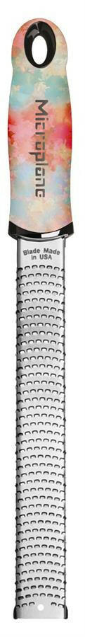 Microplane Premium Zester, Grater - Classic Blue, features a stainless-steel rasp and ergonomic handle, ideal for zesting citrus or grating hard foods efficiently.
