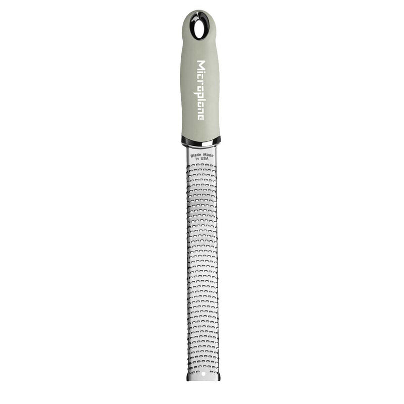 Microplane Premium Zester, Grater - Sage Green, featuring a long stainless-steel blade and ergonomic handle, ideal for zesting and grating cheeses or spices.