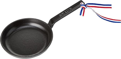 Staub Mini Cast Iron Frying Pan, ideal for small-batch cooking, showcases durable craftsmanship, fitting for Athens Cooks' curated kitchen collection.