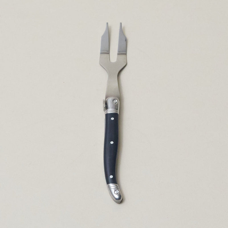 Be Home | Mini Cheese Fork - Black, featuring a Laguiole-style stainless steel blade and black handle, ideal for skewering cheese and small bites.