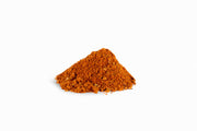 Spicewalla | Mom's Taco Seasoning: Finely ground reddish-orange spice blend for enhancing tacos and more, featuring chili, paprika, cumin, and garlic. Perfect for versatile, flavorful dishes.