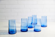 Set of 6 Moroccan Cone Glassware Large - Blue, showcasing hand-blown design with visible bubbles and organic shape, made from recycled bottles, perfect for drinks or decor.
