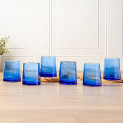Moroccan Cone Glassware Small - Blue - Set of 6, hand-blown with visible bubbles, ideal for beverages or decor. Crafted from recycled bottles, showcasing artisan skill.
