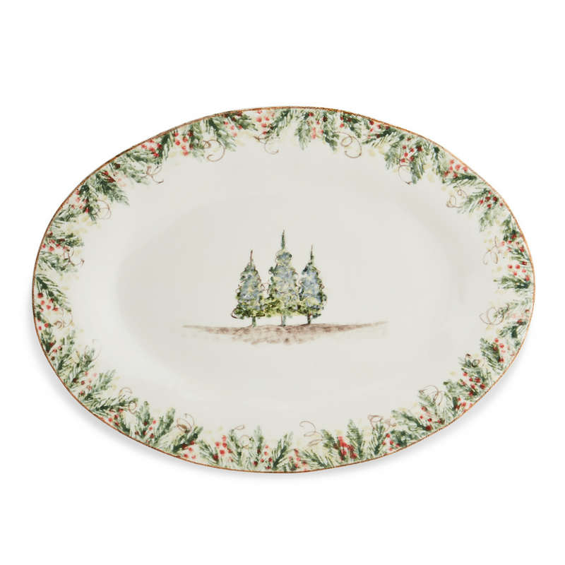 Arte Italica & Crown Linen Designs Natale Oval Platter featuring hand-painted evergreen garland, red berries, and pine trees; perfect for festive winter table settings.
