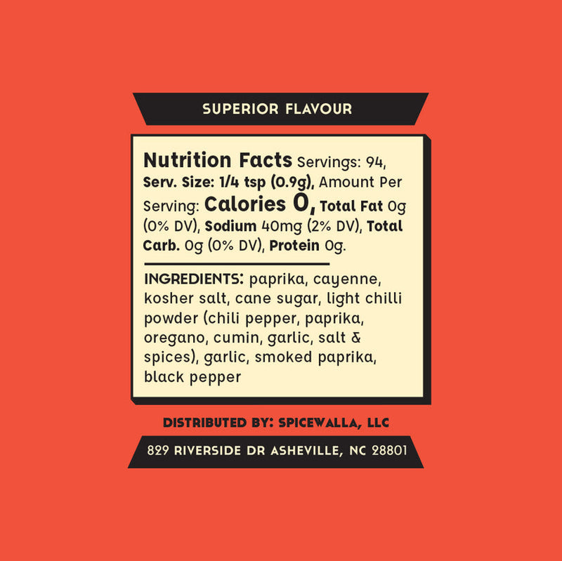 Spicewalla | N'Asheville Hot Chicken spice blend label highlighting Superior Flavour with ingredients like paprika and cayenne; ideal for fried chicken. Distributed by Spicewalla, Asheville, NC.