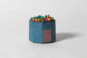 Blue concrete match holder with cork bottom, includes 70 blue matches and striker pad. Part of Athens Cooks' curated kitchen tools collection.