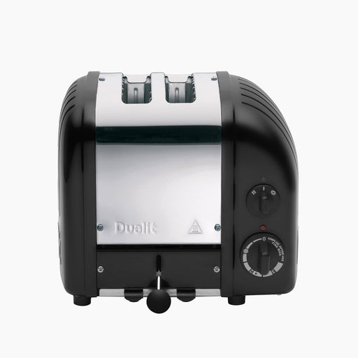 Dualit | 2 Slice Classic Toaster, Matt Black, featuring stainless-steel front, black end caps, two slots, front lever, side browning control knob, and defrost setting.