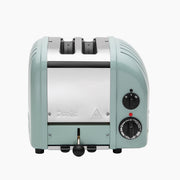 Dualit | 2 Slice Classic Toaster, Eucalyptus, featuring ProHeat elements, browning dial, defrost/reheat settings, and lever/crumb-tray assembly, perfect for Athens Cooks' curated kitchen collection.