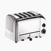 Dualit | 4 Slice Classic Toaster, Polished, featuring chrome finish, dial controls, lever, adjustable browning, bagel, and defrost settings.