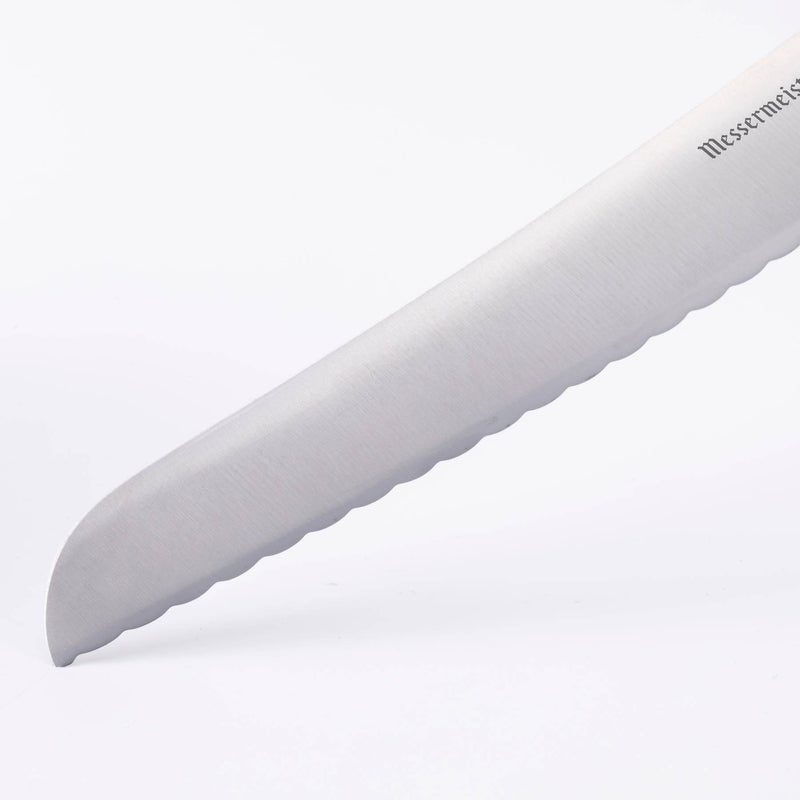 Messermeister | Oliva Elite Reverse Scalloped Utility Knife, 6 inches, featuring a serrated stainless-steel blade for effortless slicing, ideal for citrus and sandwiches.
