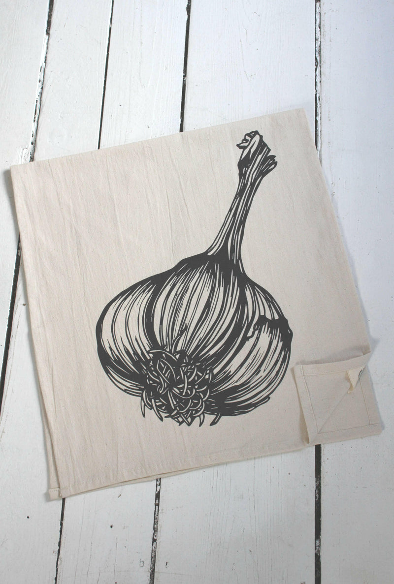 Hearth and Harrow Organic Cotton Garlic Tea Towel featuring a hand-printed garlic design on a large, eco-friendly cotton towel, ideal for stylish kitchen use.