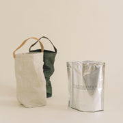 UASHMAMA | Wine Bag Carrying Totes with Cooler features durable washable paper and a leather strap, ideal for stylish wine transport and gifting.