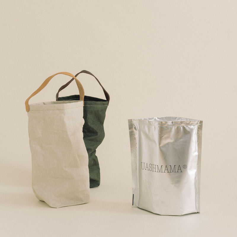 UASHMAMA | Wine Bag Carrying Totes with Cooler features durable washable paper and a leather strap, ideal for stylish wine transport and gifting.