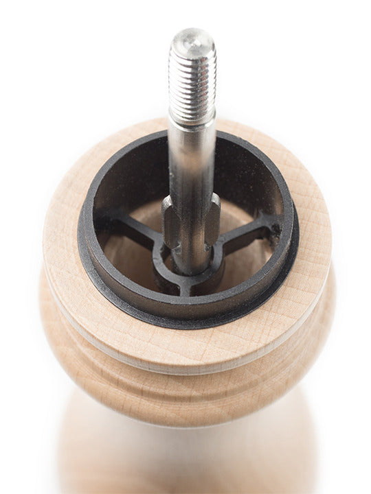 Peugeot | Paris u'Select Pepper Mill Natural Wood, 12 inches, showing the internal grinding mechanism with metal spindle and black plastic grinding-burr assembly, highlighting craftsmanship and innovation.