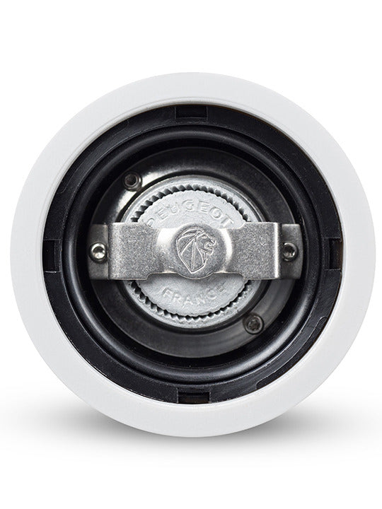 Close-up of the Peugeot | Paris u'Select Pepper Mill's grinding mechanism, showcasing the Peugeot lion logo and France mark, highlighting its renowned craftsmanship.