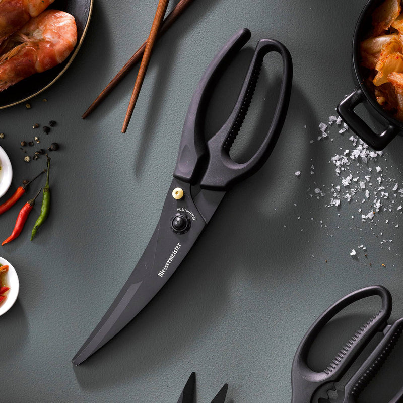 Messermeister Push Button Take-Apart Poultry Shears, 10 inches, on gray surface with shrimp, chili peppers, and kimchi, showcasing precision blades and ergonomic design.