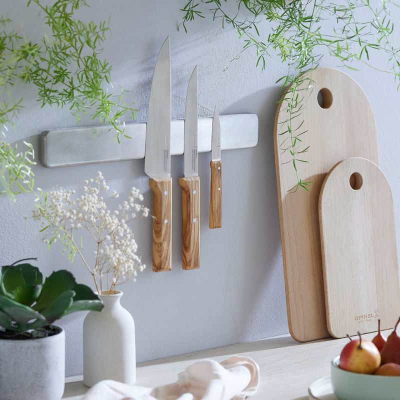 Opinel | Parallele Trio Chef Knife Set on a magnetic board, featuring robust blades and olive wood handles, perfect for upgrading your kitchen tools.