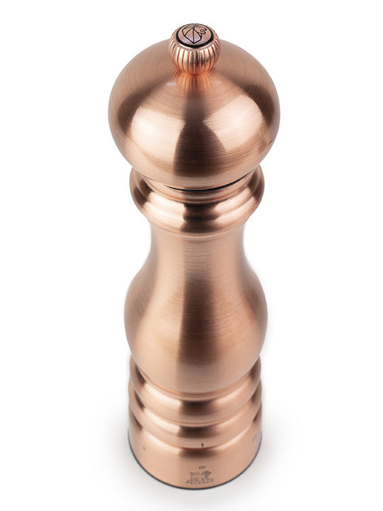 Peugeot | Paris Chef u'Select Pepper Mill, Copper, 9 inches, features a copper-coated, ergonomic design with a knurled knob for adjustable grinding, viewed from above.
