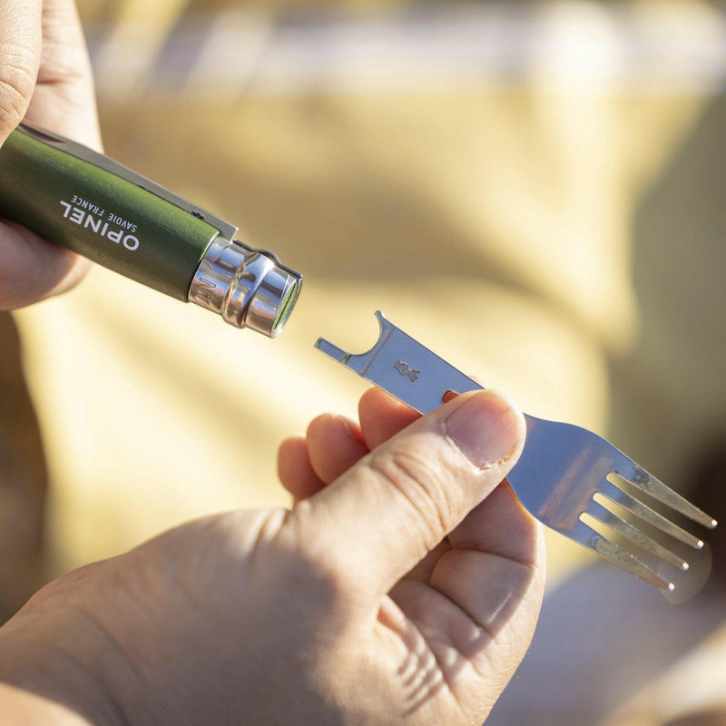 Opinel | No 8 Carbon Steel Folding Knife - Picnic Cutlery+ Set displayed, showcasing the multi-tool being pulled from the classic green anodized handle.