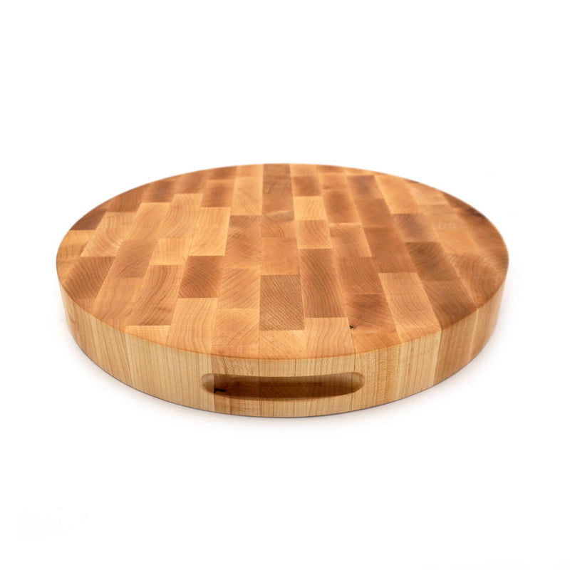 Round 16-inch maple end grain cutting board by J.K. Adams, ideal for professional kitchen use, available at Athens Cooks.