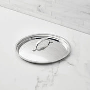 Hestan Provisions | Stainless Steel Lids Large, 12.5 with center handle, rests on countertop; crafted for optimal heat retention and flavor, ideal for precise cooking.
