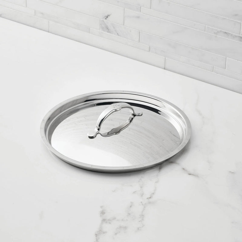 Hestan Provisions | Stainless Steel Lids Large, 12.5 with center handle, rests on countertop; crafted for optimal heat retention and flavor, ideal for precise cooking.