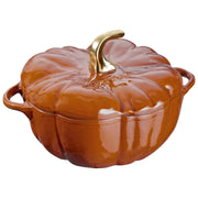 Staub Pumpkin Cocotte in burnt orange, cast iron pot shaped like a pumpkin, ideal for soups and stews, showcasing French culinary craftsmanship.