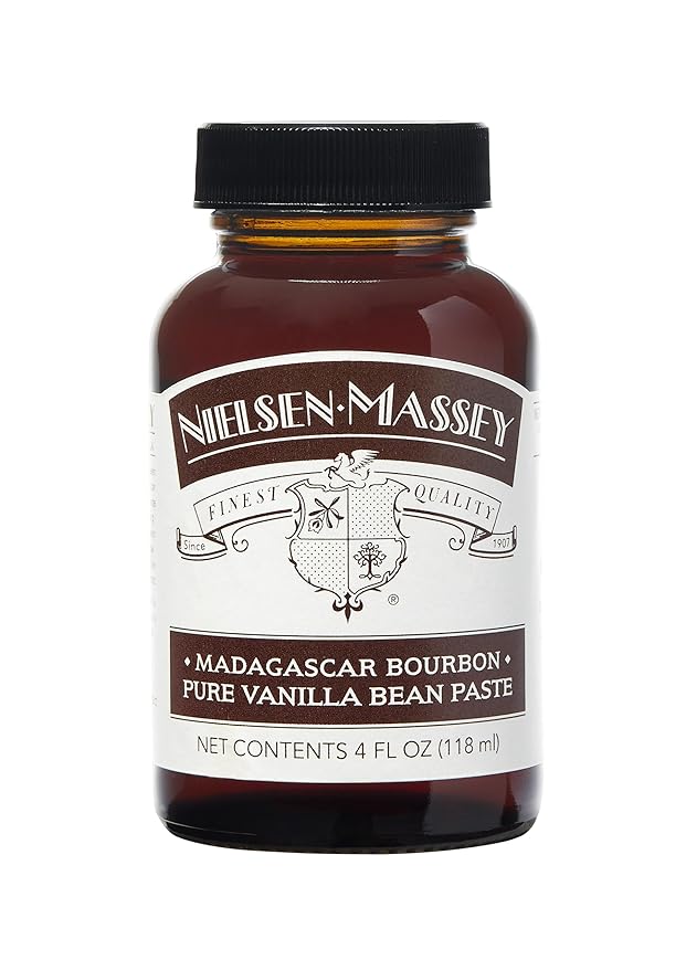 Nielsen-Massey | Pure Madagascar Bourbon Vanilla - 4oz Bean Paste bottle with visible vanilla bean specks, ideal for enhancing flavors and presentation in baking.