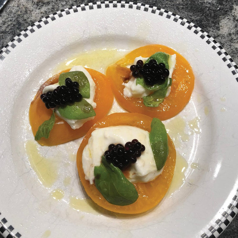 Reale | Balsamic Pearls - Classic elegantly presented on a plate, showcasing culinary artistry with a garnish, ideal for enhancing dishes at Athens Cooks.