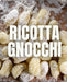 Close-up view of freshly made ricotta gnocchi sprinkled with flour on a wooden surface. The words "COOKING CLASS | Ricotta Gnocchi Dinner with Chef Hunter, Wednesday 16 October, 6:00pm - 8:00pm" are written prominently in large white letters across the center, as if inviting you to join Athens Cooks' hands-on cooking experience.