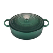 Le Creuset Signature Round Wide Oven - Meringue, a 6.75-quart enameled cast-iron Dutch oven with handles and a lid, perfect for versatile cooking.
