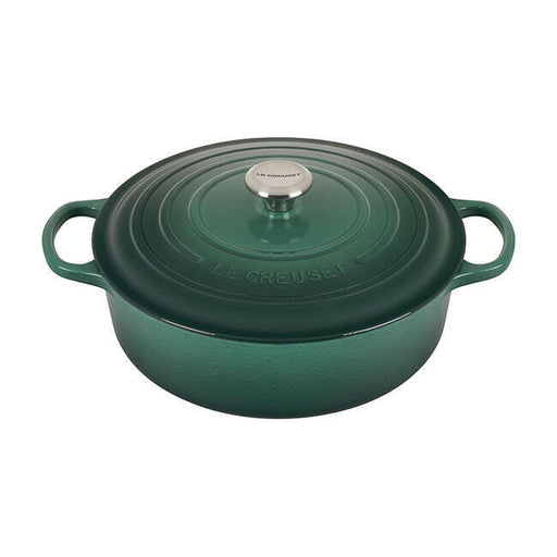 Le Creuset Signature Round Wide Oven - Meringue, a 6.75-quart enameled cast-iron Dutch oven with handles and a lid, perfect for versatile cooking.