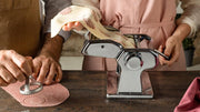 Marcato | Atlas 150 Pasta Maker in use, showcasing its manual pasta rolling and cutting capabilities for homemade Italian pasta.