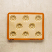 Silpat Reusable Silicone Baking Molds - Tartelette Mold with 12 holes for perfectly shaped pastries, ideal for baking enthusiasts seeking durable, non-stick bakeware solutions.