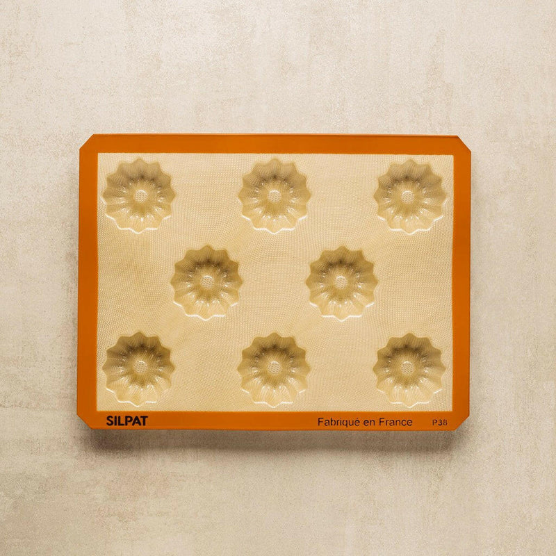 Silpat Reusable Silicone Baking Molds - Tartelette Mold with 12 holes for perfectly shaped pastries, ideal for baking enthusiasts seeking durable, non-stick bakeware solutions.