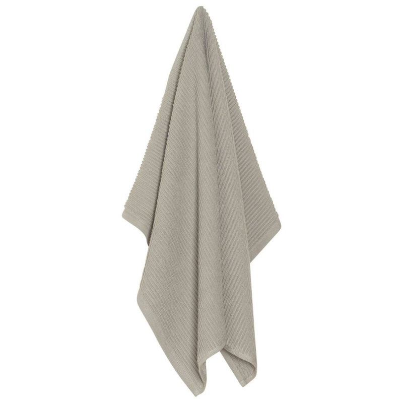 Danica | Ripple Dishtowel - London Gray, hanging on a hook, showcasing its textured softness and absorbency, ideal for enhancing your kitchen experience.