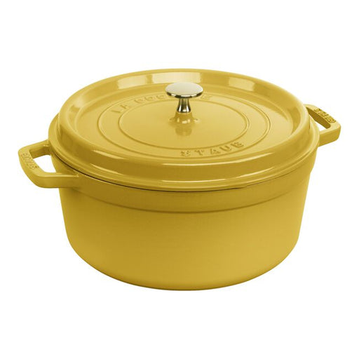 Staub 5.5 qt Citron Cocotte, perfect for slow-cooking, features a self-basting lid and matte black enamel interior, ideal for professional and home kitchens.