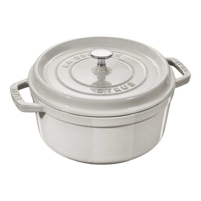 STAUB Round Cocotte 7 qt White Truffle, a durable cast iron pot with a self-basting lid, ideal for slow-cooking and serving elegant meals.