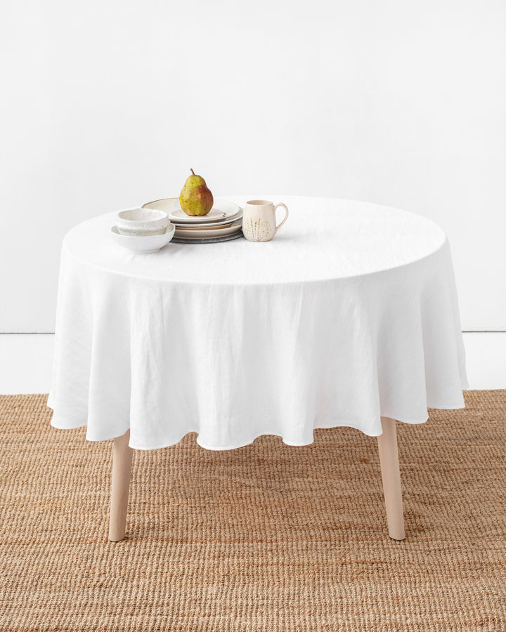 MagicLinen | Round Linen Tablecloth - White 79 Inches Round, ideal for versatile dining settings, with a contemporary seam, perfect for mixing with napkins and runners.