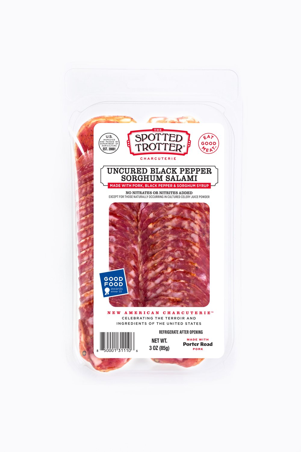 Spotted Trotter | Salamis - Black Pepper Sorghum, artisanal salami with visible marbling and spices, crafted from high-quality pork, embodying traditional Spanish flavors.