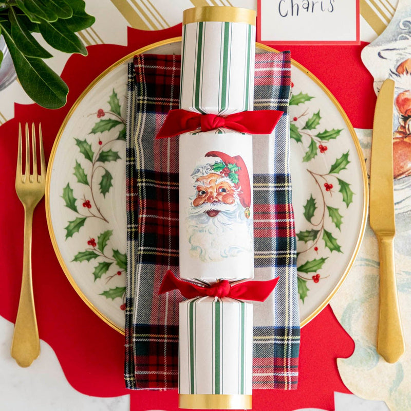 Hester & Cook | Christmas Crackers - Santa: Festive party crackers containing a honeycomb ball, confetti, gold crown, and conversation card, perfect for holiday gatherings.