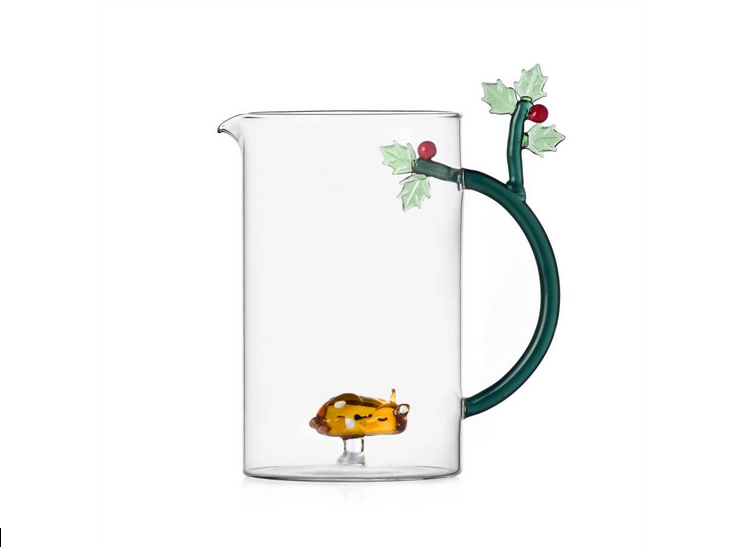 Ichendorf | Fawn Jug: A glass carafe with a holly-inspired handle and an amber-gold fish figurine inside, exemplifying Athens Cooks' unique kitchenware selection.
