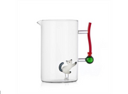 Ichendorf | Tabby Cat Jug: A clear glass pitcher featuring an internal glass kitten and decorative red handle, blending whimsy and function for holiday gatherings.