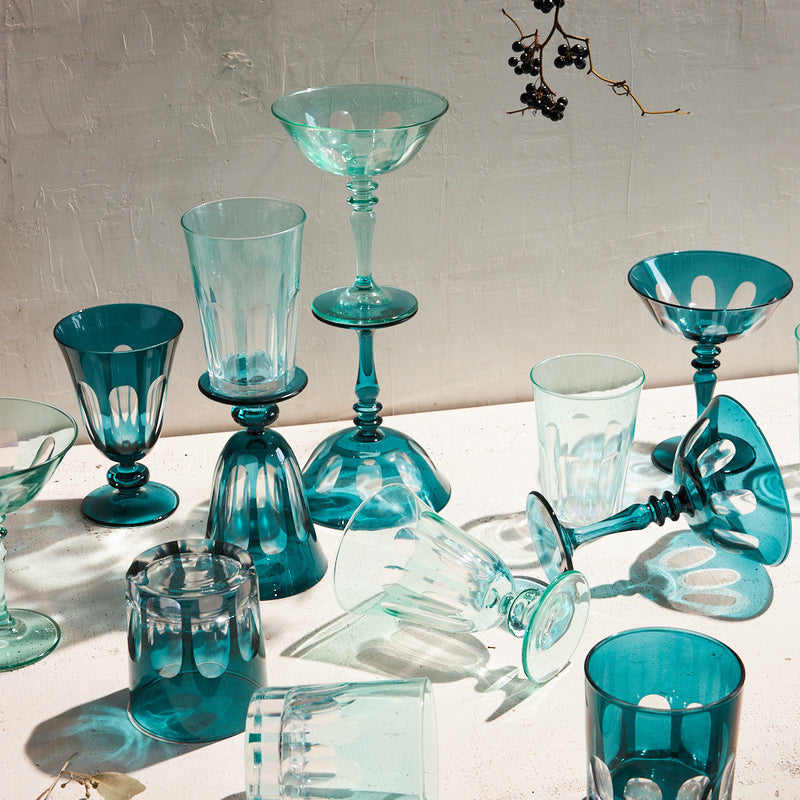 Sir|Madam Rialto Menthe coupe styled with the green/teal Rialto glassware collection in natural light